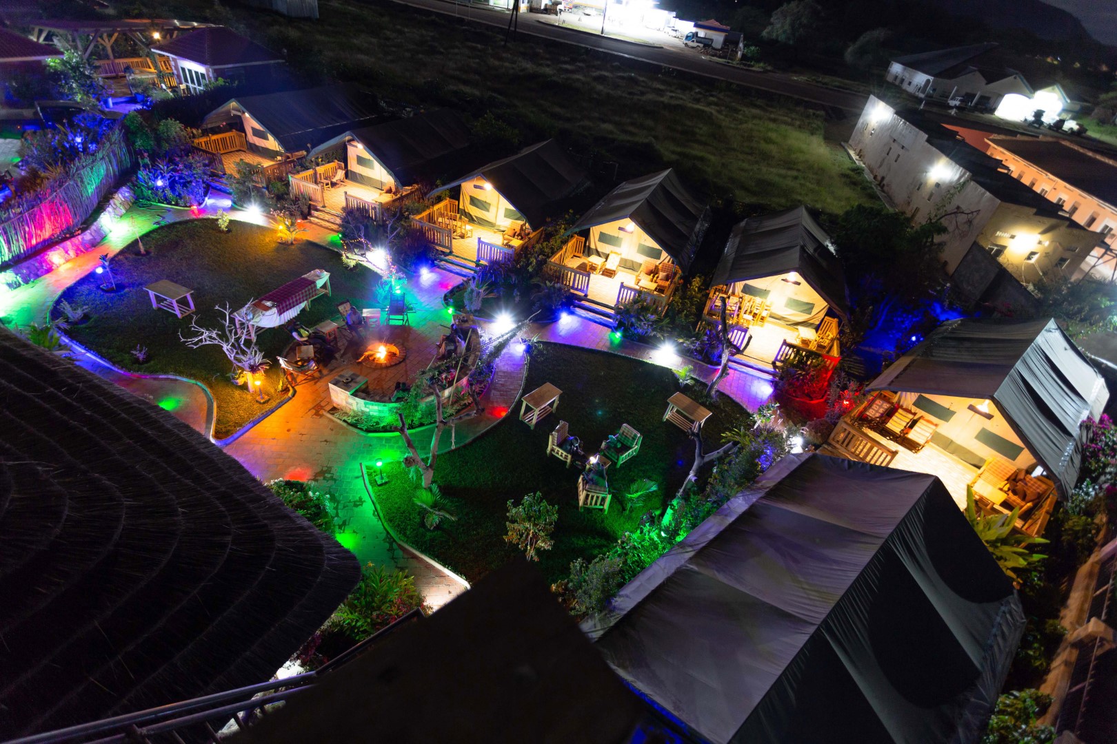 The Safari Camp lit up at night